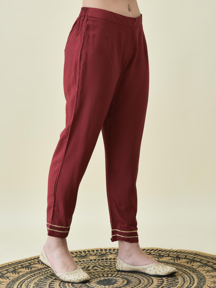 Women Liva Rayon Maroon Solid Kurta Trouser Dupatta.