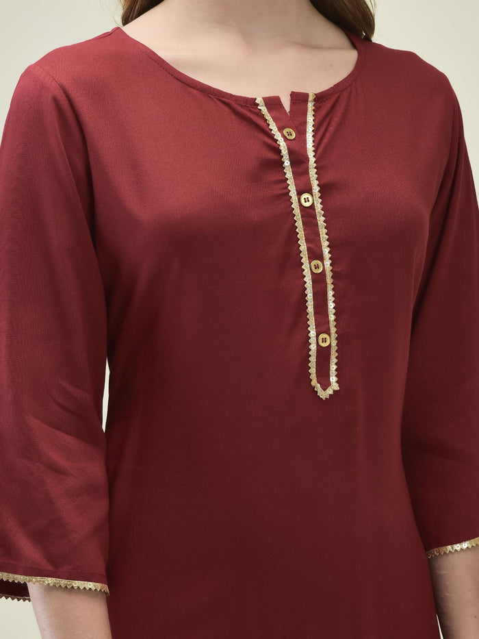 Women Liva Rayon Maroon Solid Kurta Trouser Dupatta.