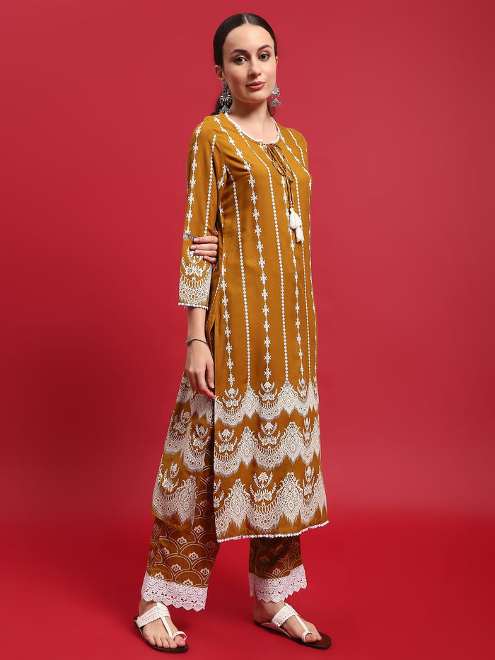 Women Liva Rayon Mustard Ornamental Print Kurta With Comfort Pant.