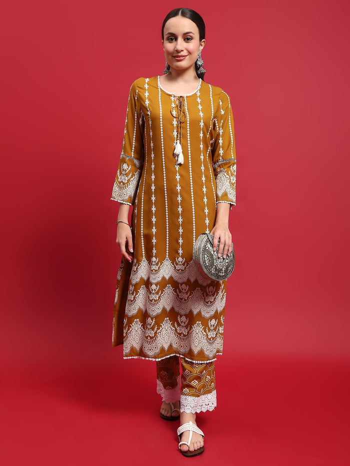 Women Liva Rayon Mustard Ornamental Print Kurta With Comfort Pant.