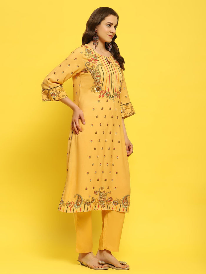 Women Liva Rayon Yellow Floral Print Kurta Trouser Dupatta.