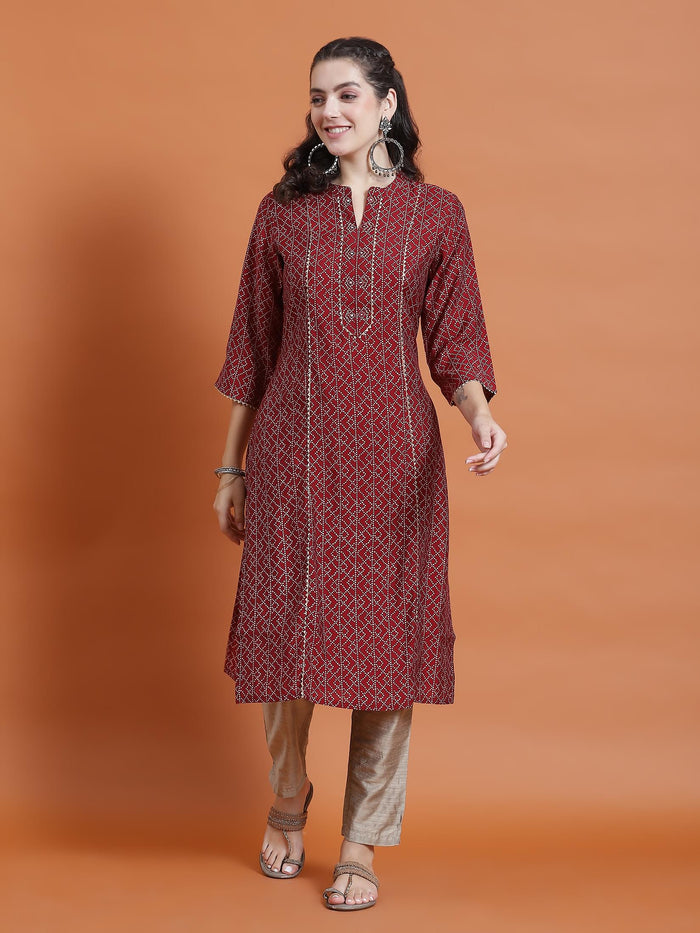Women Maroon Geometric Print Kurta With Trouser.