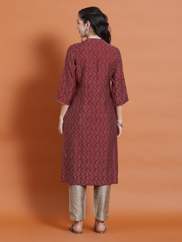 Women Maroon Geometric Print Kurta With Trouser.