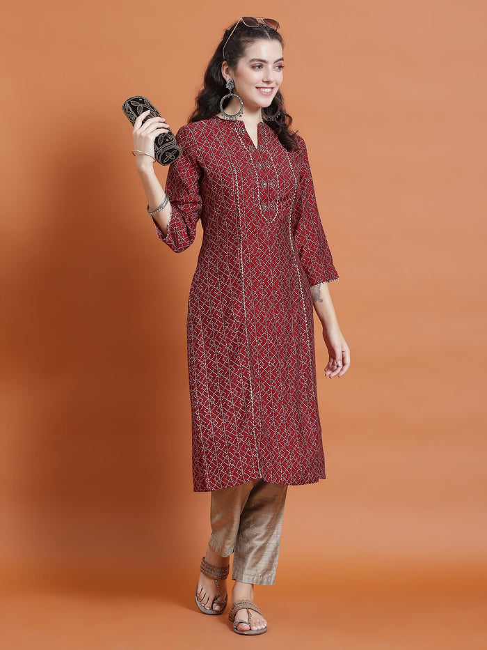 Women Maroon Geometric Print Kurta With Trouser.