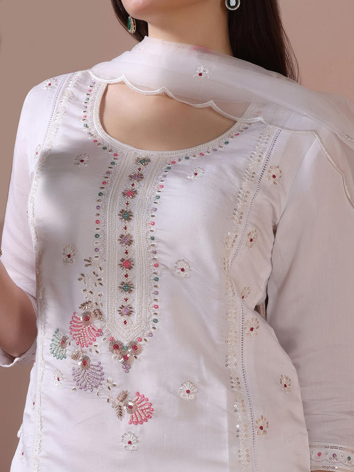 Women Mul Chanderi White Embroidered Kurta Trouser Dupatta.