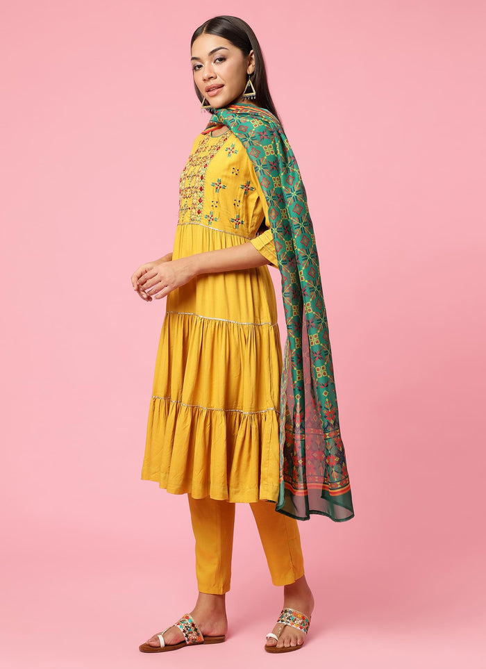 Women Mustard Embroidered Kurta Trouser Dupatta.