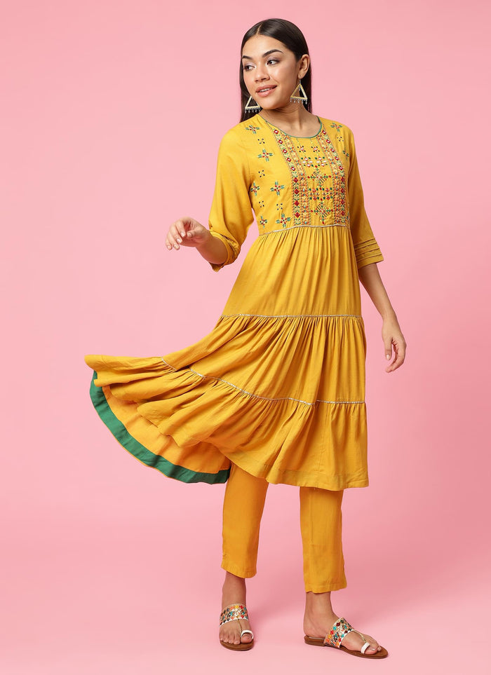 Women Mustard Embroidered Kurta Trouser Dupatta.