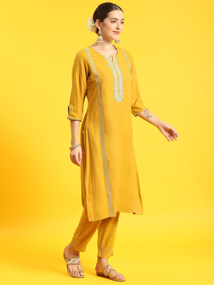 Women Mustard Embroidered Kurta Trouser Dupatta.