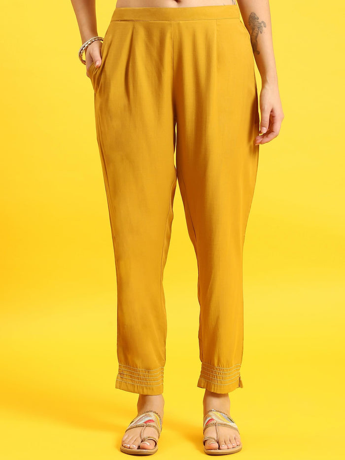Women Mustard Embroidered Kurta Trouser Dupatta.