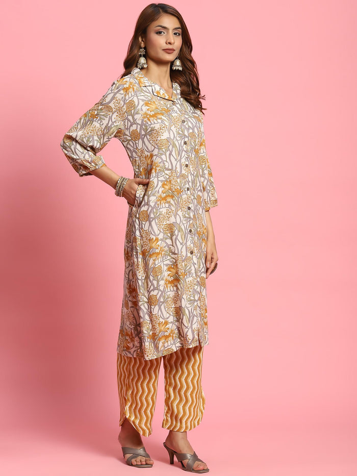 Women Mustard Floral Printed Kurta With Comfort Pant.