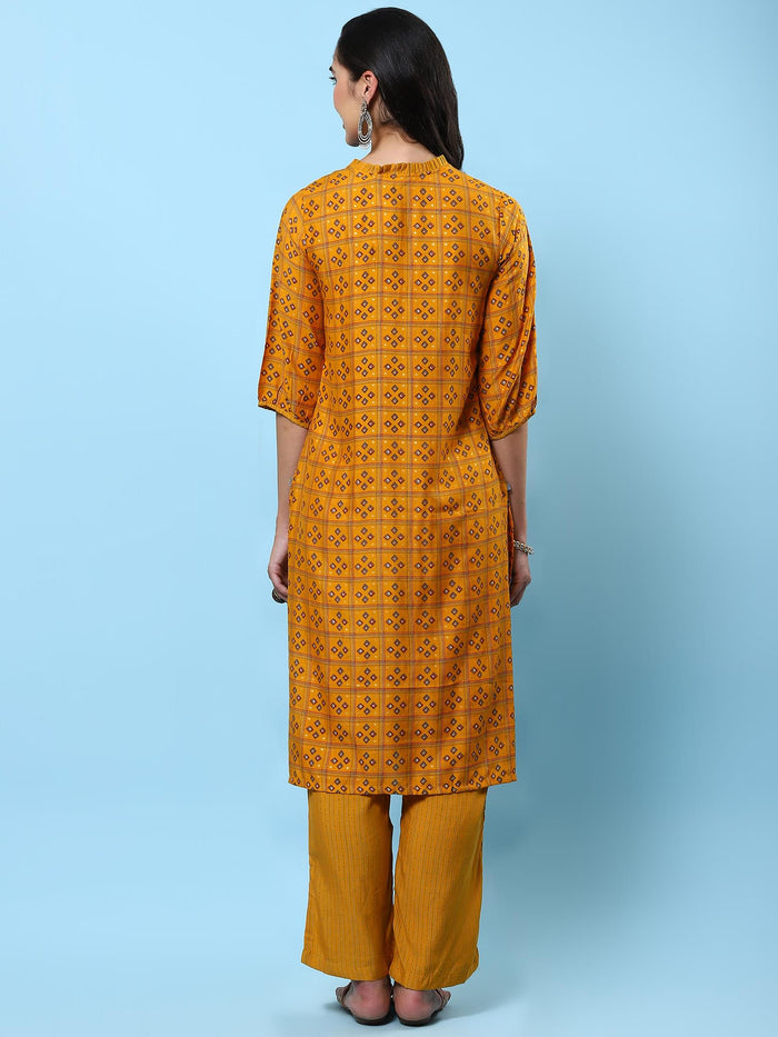 Women Mustard Geometric Printed Kurta With Comfort Pant.