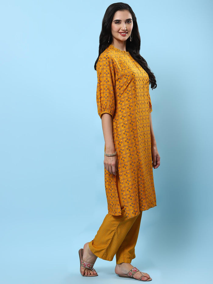Women Mustard Geometric Printed Kurta With Comfort Pant.