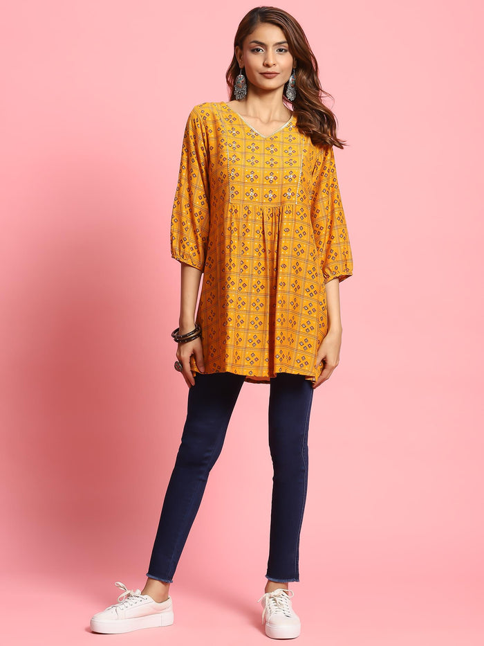 Women Mustard Geometric Printed Tunic.