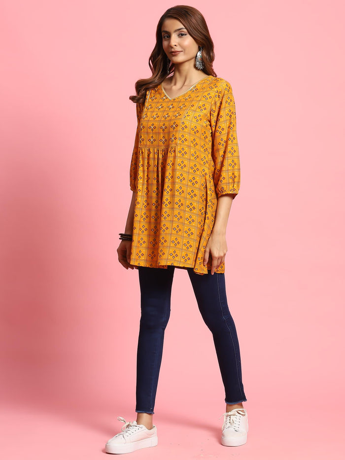Women Mustard Geometric Printed Tunic.