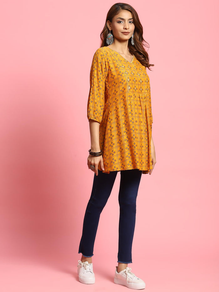 Women Mustard Geometric Printed Tunic.