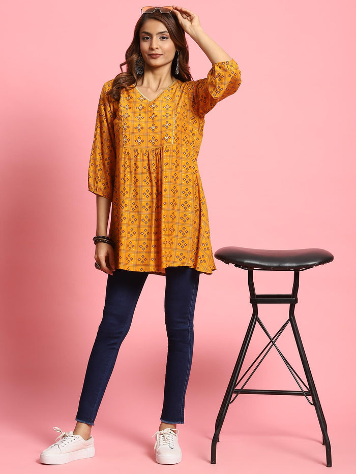 Women Mustard Geometric Printed Tunic.