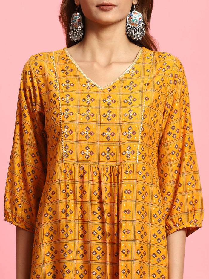 Women Mustard Geometric Printed Tunic.