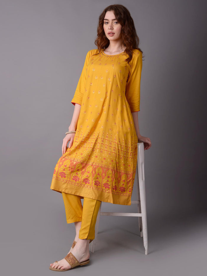 Women Mustard Ornamental Printed Kurta With Trouser.