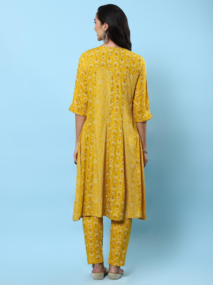 Women Mustard Ornamental Printed Kurta With Trouser.