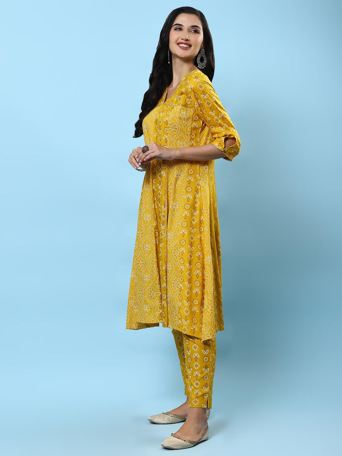 Women Mustard Ornamental Printed Kurta With Trouser.