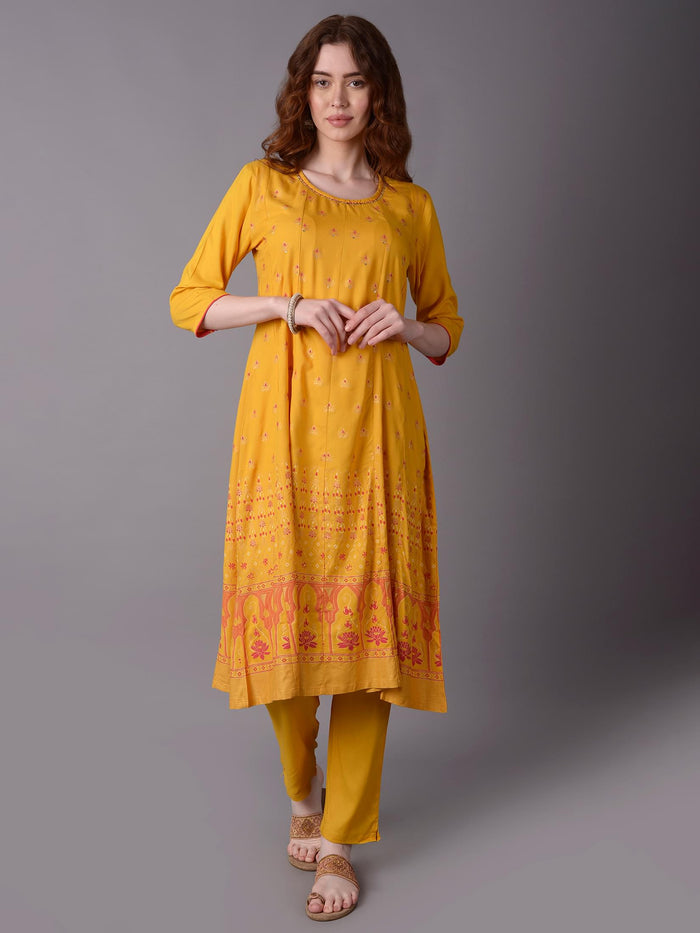 Women Mustard Ornamental Printed Kurta With Trouser.