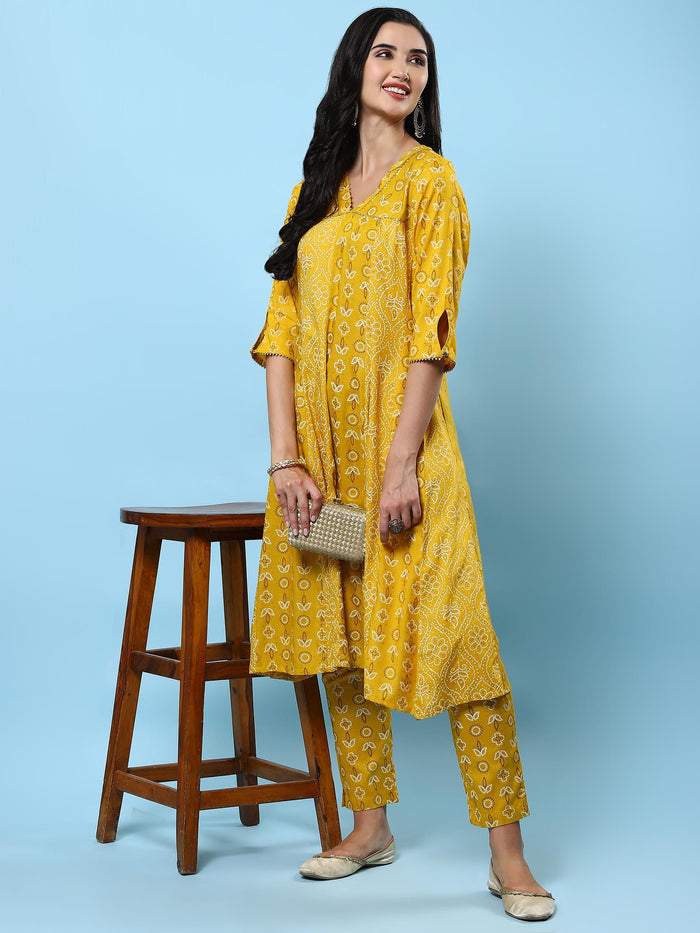 Women Mustard Ornamental Printed Kurta With Trouser.