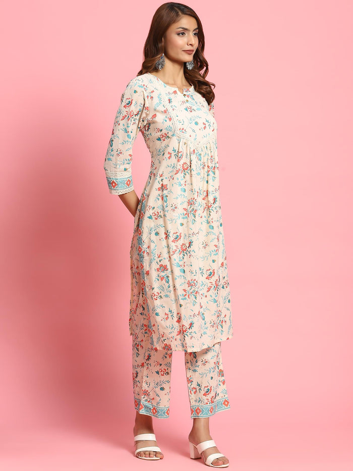 Women Off White Floral Printed Kurta With Comfort Pant.