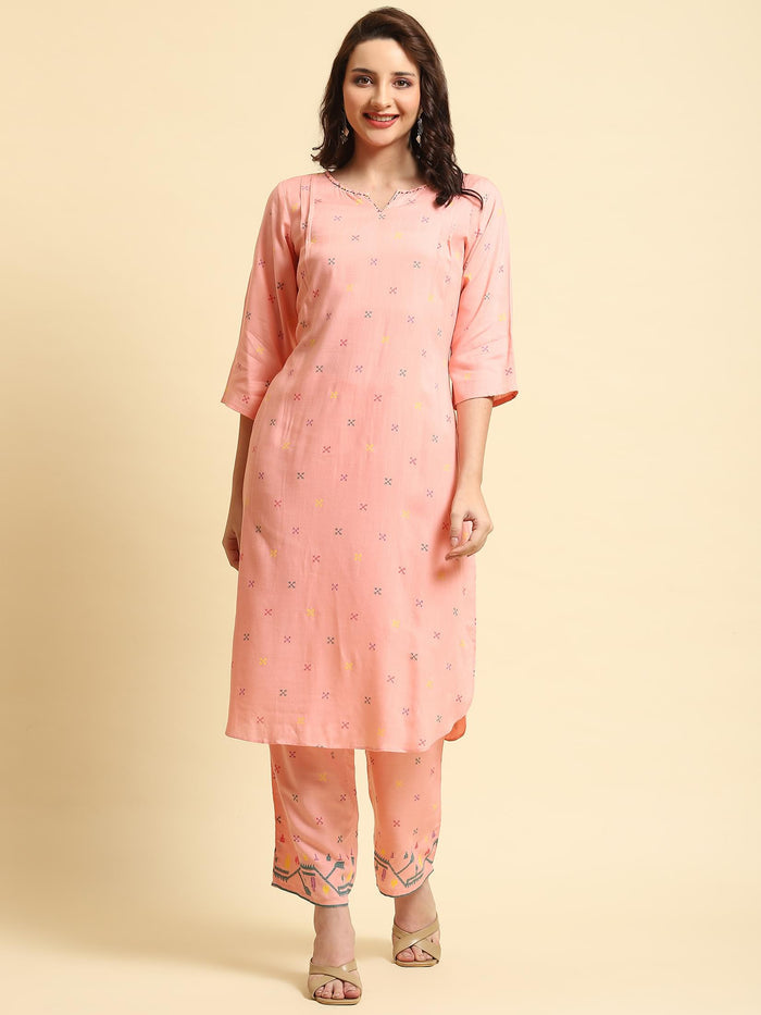 Women Pink Geometric Printed Kurta With Comfort Pant.