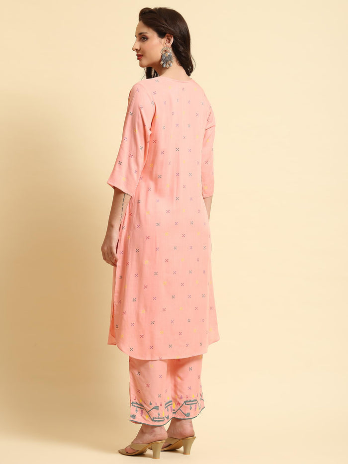 Women Pink Geometric Printed Kurta With Comfort Pant.