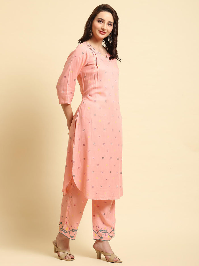 Women Pink Geometric Printed Kurta With Comfort Pant.