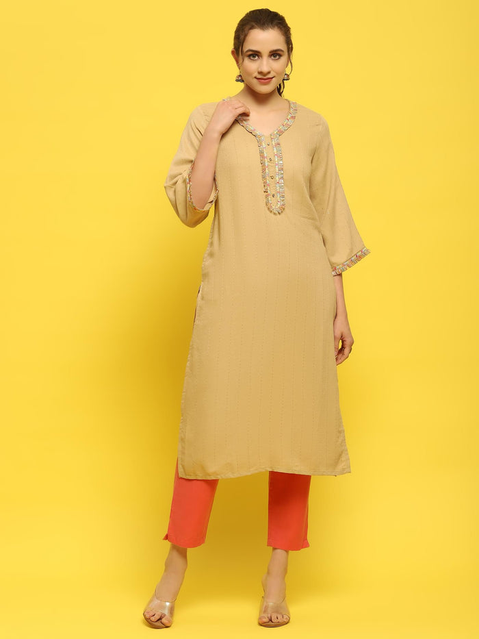 Women Poly Viscose Beige Solid Kurta.