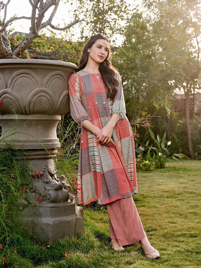 Women Rayon Rust Multi Kurta With Comfort Pant.