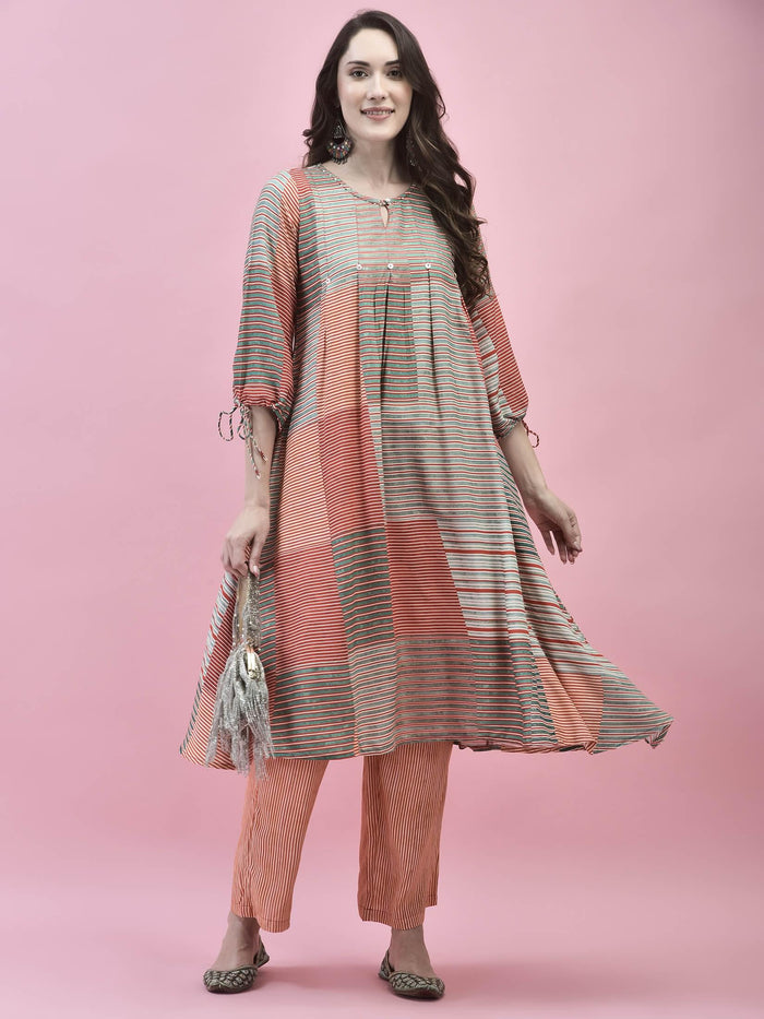 Women Rayon Rust Multi Kurta With Comfort Pant.