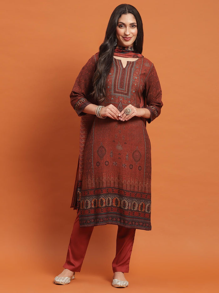 Women Rust Ornamental Print Kurta Trouser Dupatta.