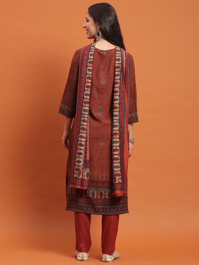 Women Rust Ornamental Print Kurta Trouser Dupatta.