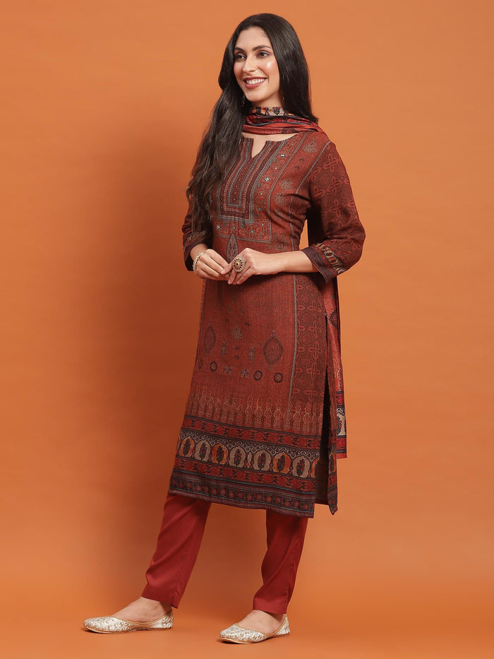 Women Rust Ornamental Print Kurta Trouser Dupatta.