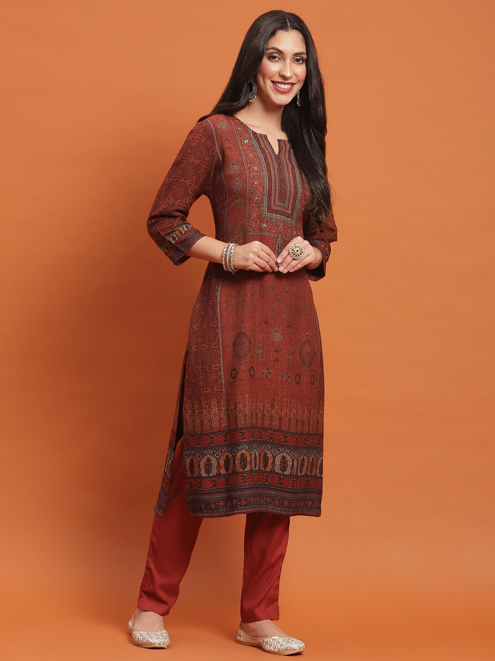 Women Rust Ornamental Print Kurta Trouser Dupatta.