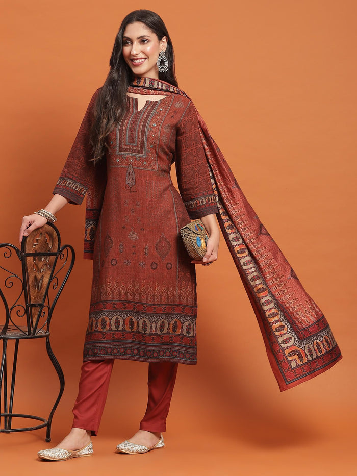 Women Rust Ornamental Print Kurta Trouser Dupatta.