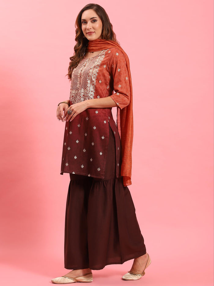 Women Rust Ornamental Printed Kurta Sharara Dupatta.