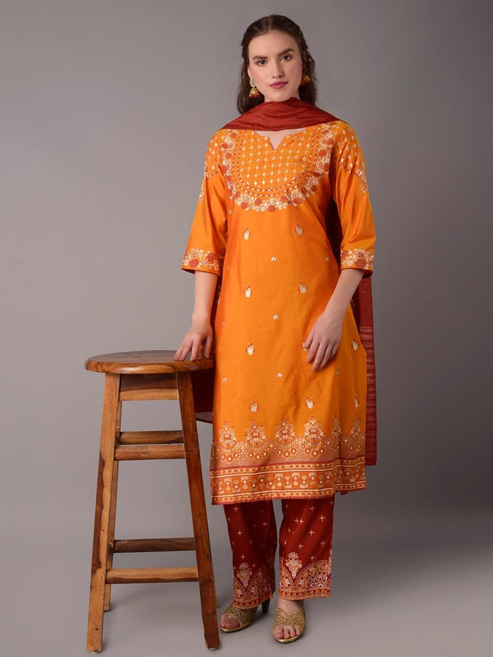 Women Yellow Ornamental Printed Kurta Salwar Dupatta.