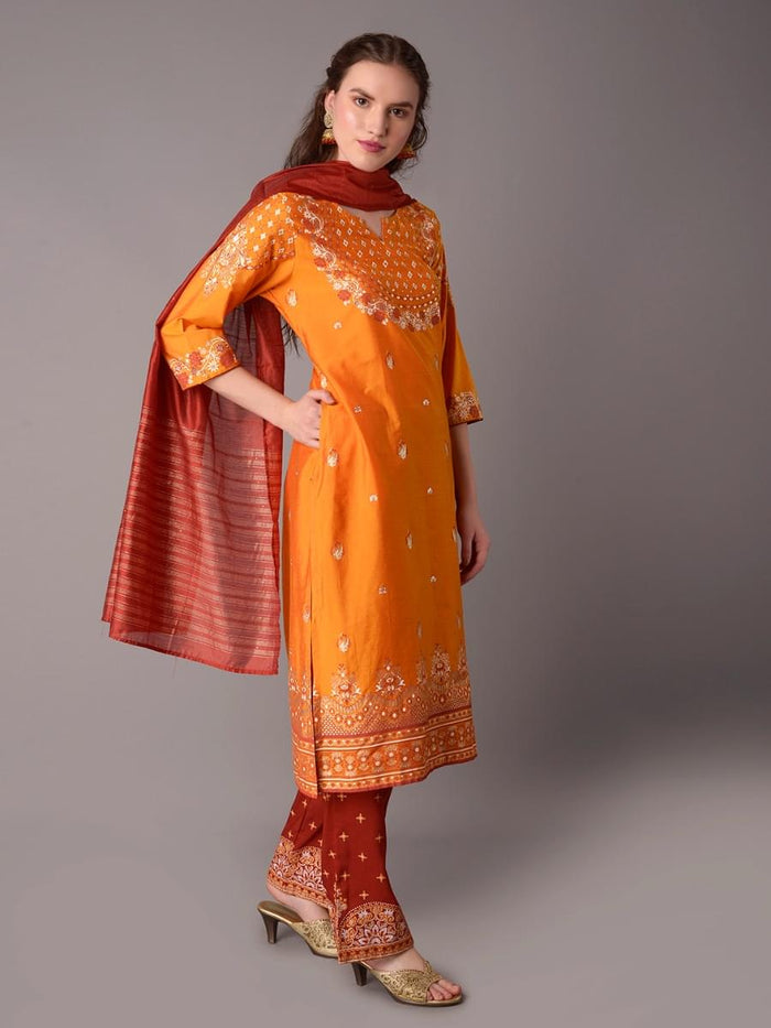 Women Yellow Ornamental Printed Kurta Salwar Dupatta.